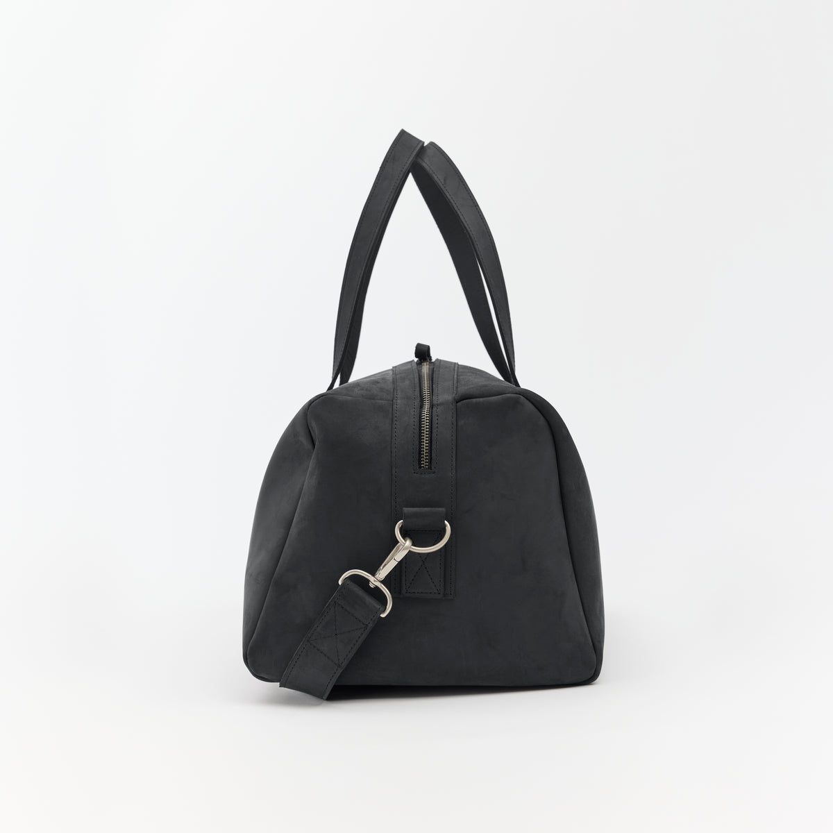 Black leather duffel bag with a silver clasp on a white background