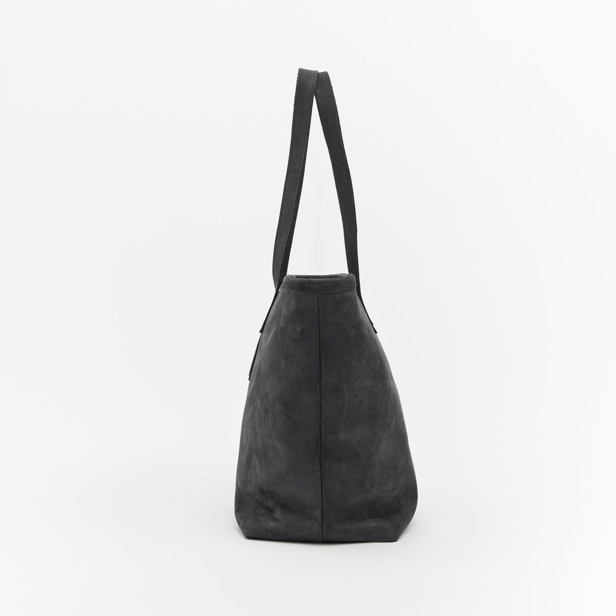 Black leather tote bag on a white background