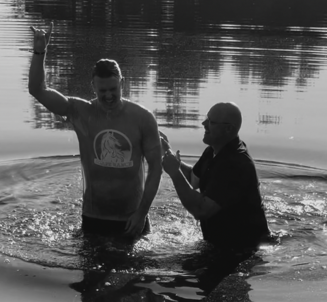 Jake being baptized by his mentor