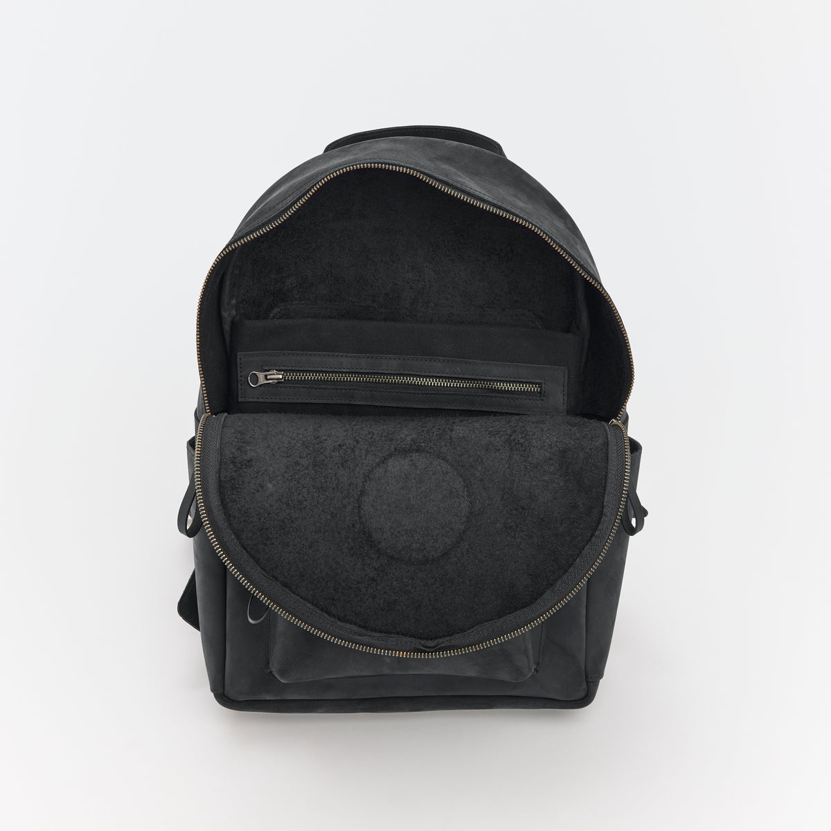 Black leather backpack with an open pocket on a white background