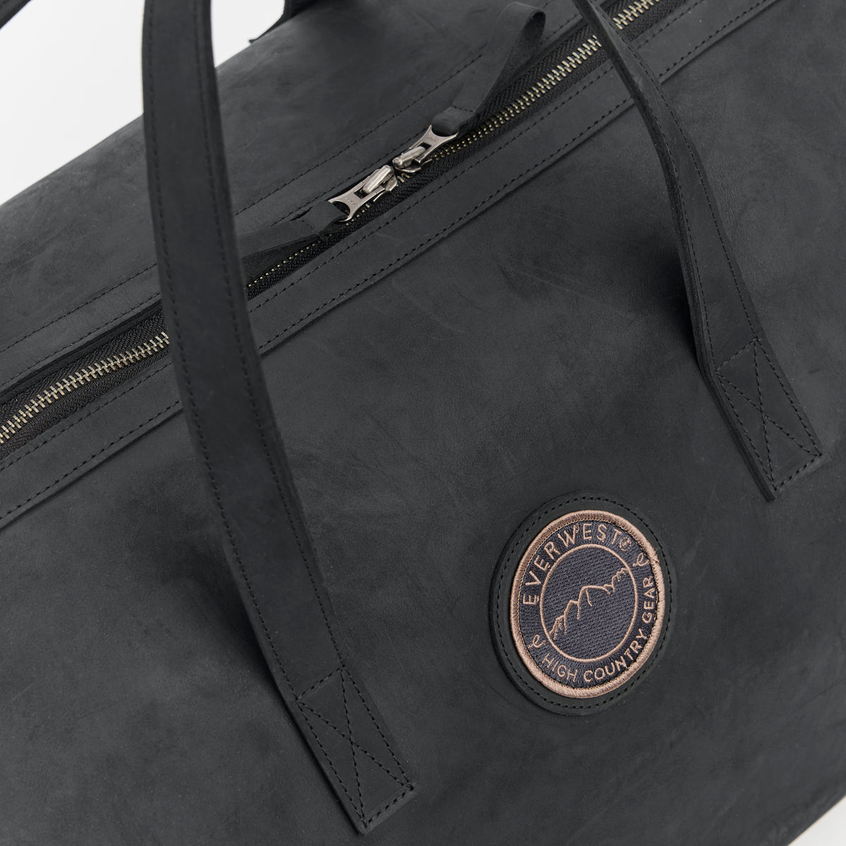 Large black leather duffel bag with the Everwest brand logo on a white background