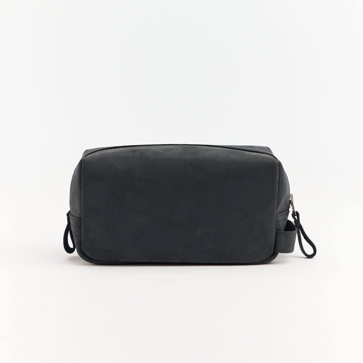 Black leather toiletry bag on a white background