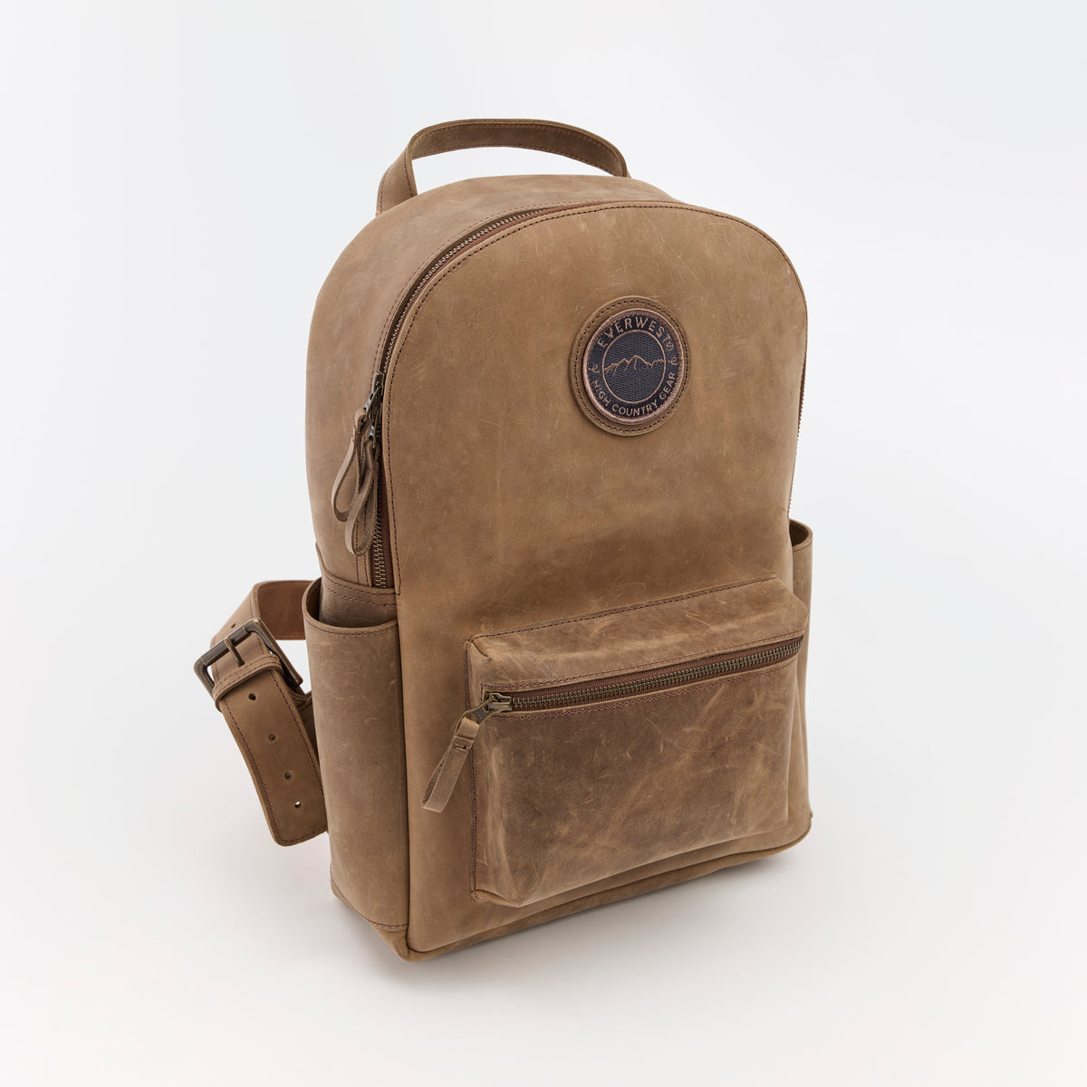 Brown leather backpack with the Everwest brand logo on a white background