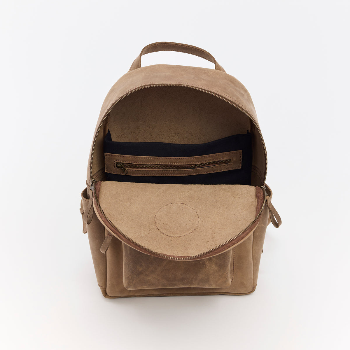 Brown leather backpack with an open front pocket on a white background